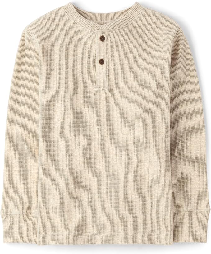 Oatmeal waffle knit toddler henley with long sleeves and two brown buttons at the neck.