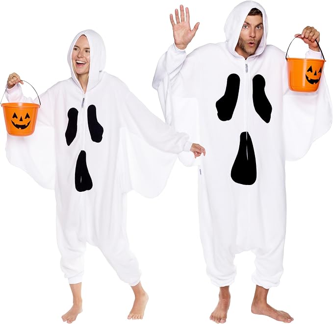 Two adults wearing white plush ghost onesies with black ghost faces, holding pumpkin candy buckets.