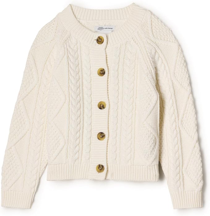 Ivory toddler cable knit cardigan with tortoiseshell buttons.