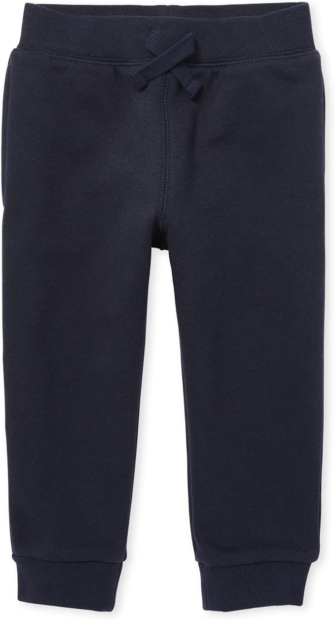 Navy toddler knit joggers with a drawstring elastic waist and ribbed cuffs.