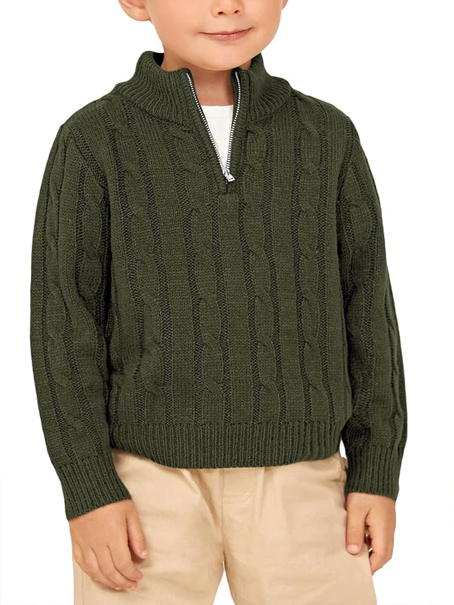 Toddler boy wearing an army green cable knit quarter zip sweater.