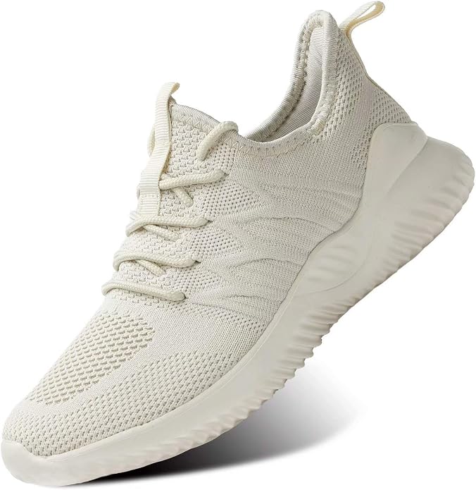 Cream knit walking sneaker with a cushioned white sole.