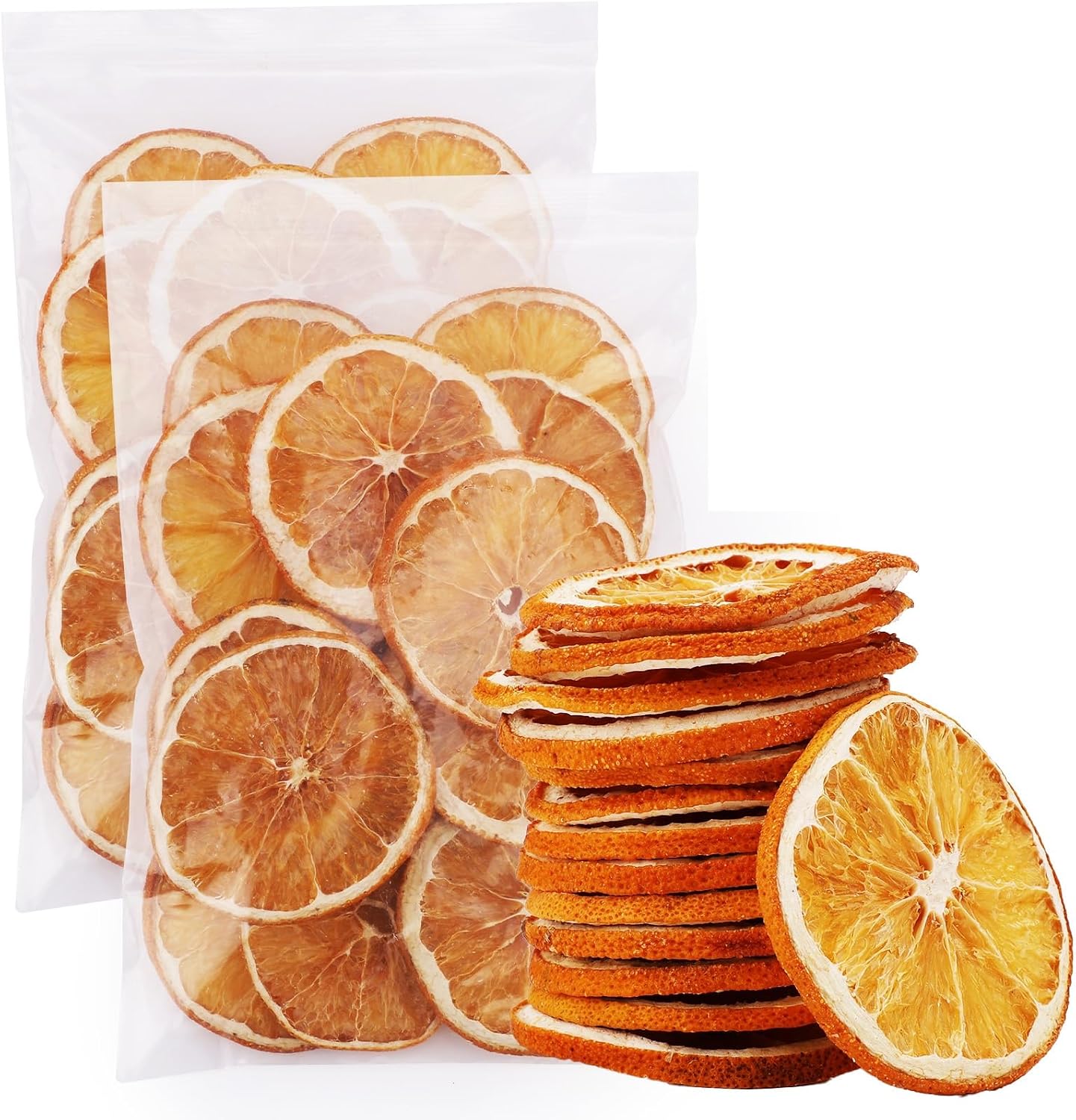 Two resealable bags of dried orange slices next to a stack of loose dried orange rounds.