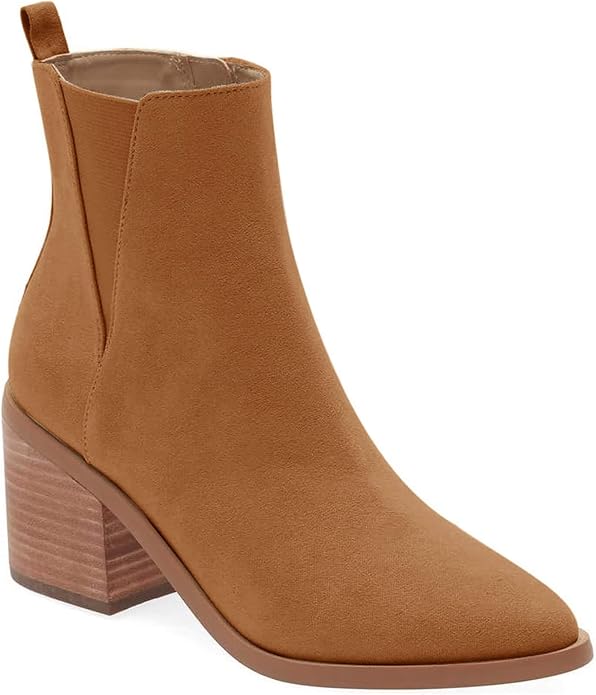 Tan suede pointed toe Chelsea bootie with a stacked wooden heel.
