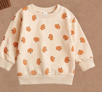 Cream toddler pullover sweatshirt covered in a small orange pumpkin print.