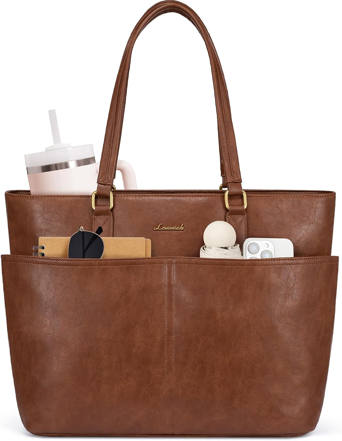 Brown faux leather tote bag with front pockets holding a notebook, sunglasses, and a tumbler.