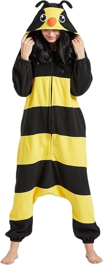 Adult wearing a black and yellow striped fleece bee onesie with a hood that has antennae and a bee face.