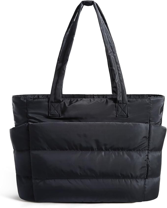 Black quilted puffy tote bag with padded handles.