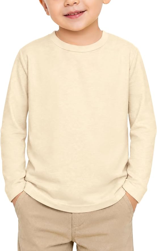 Toddler wearing a plain cream long sleeve crew neck tee.