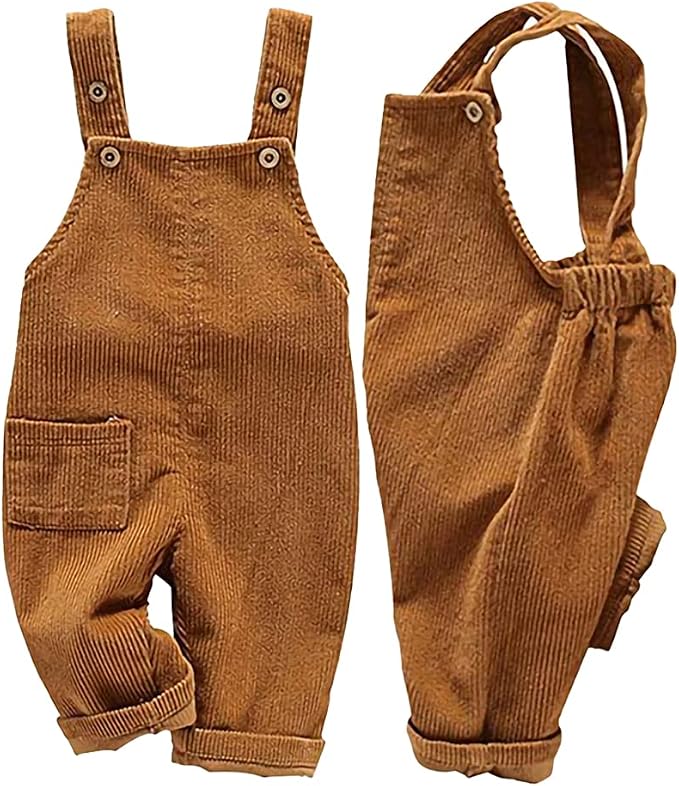 Rust brown toddler corduroy overalls with adjustable button straps, a front patch pocket, and rolled cuffs.