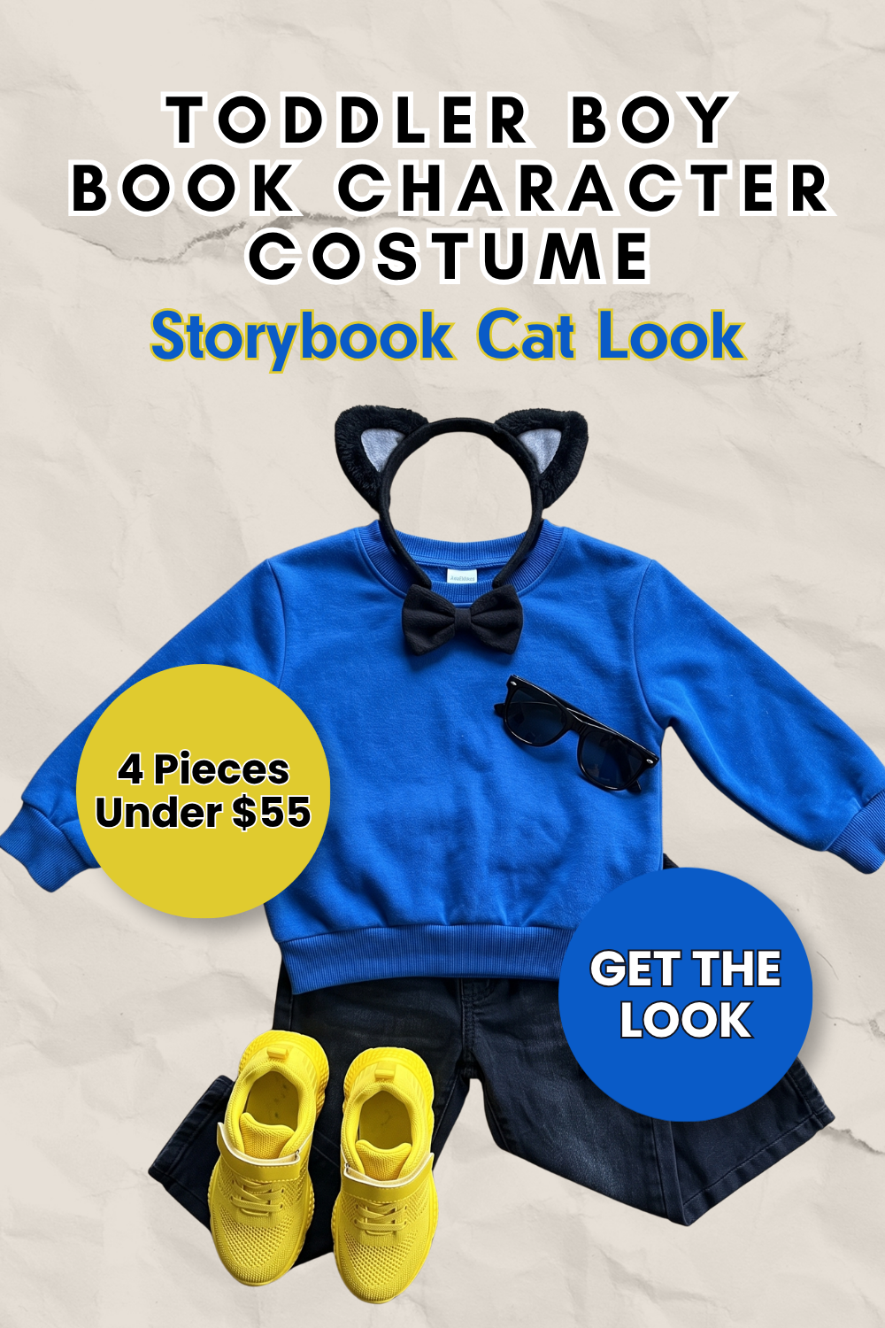 Pin graphic titled 'Toddler Boy Book Character Costume: Storybook Cat Look' showing black cat ears with a bow tie, a royal blue crewneck sweatshirt, dark jeans, yellow sneakers and black sunglasses.