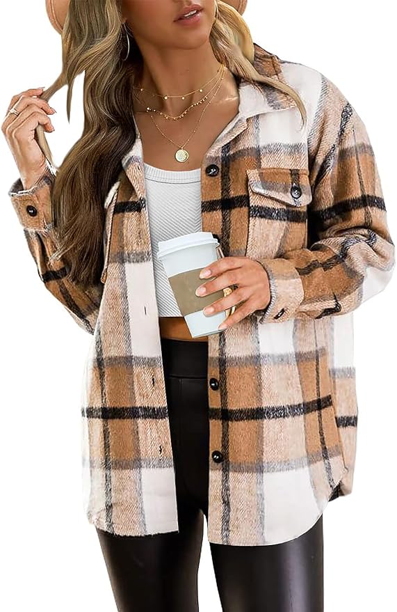 Woman wearing an oversized camel and cream plaid flannel shacket over a white top.