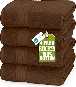 Stack of four folded dark brown cotton bath towels.
