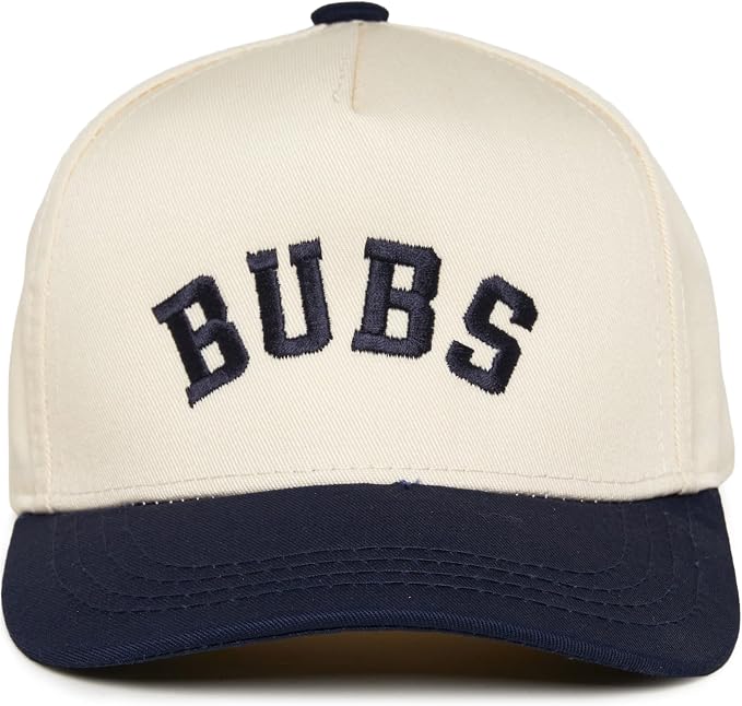 Cream toddler trucker cap with navy embroidered BUBS lettering and a navy brim.