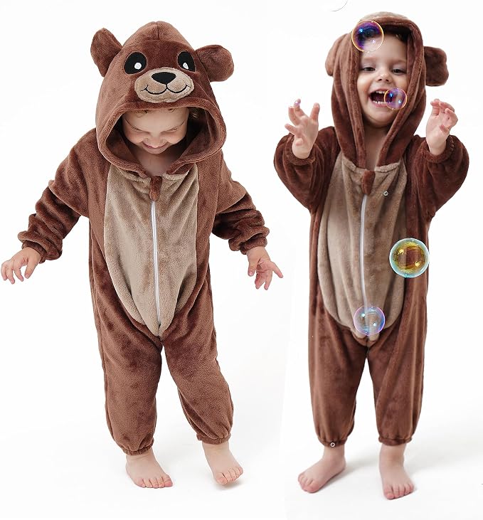 Toddler wearing a soft brown hooded bear onesie with a cream belly panel.