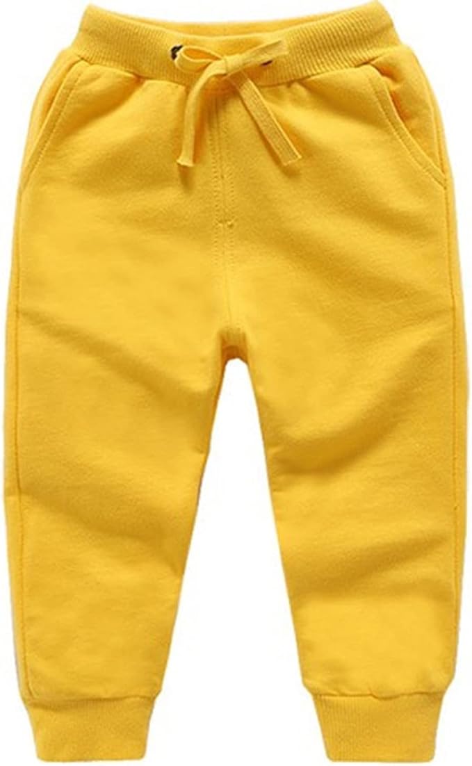 Mustard yellow toddler joggers with drawstring and ribbed cuffs.